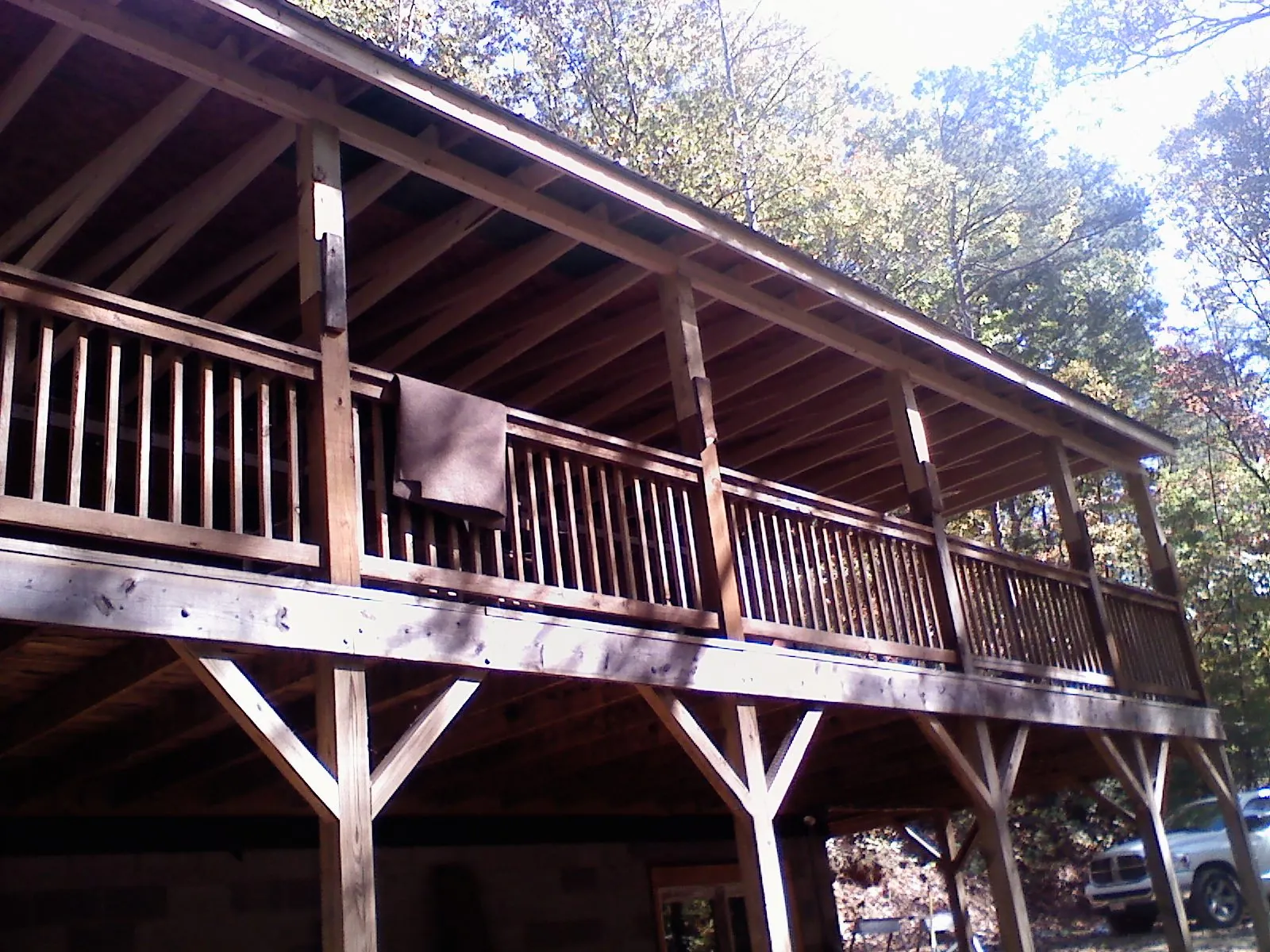 Timber framing under a new elevated porch and deck — Roof Leak Repair in Coon Rapids by Roofing Brothers